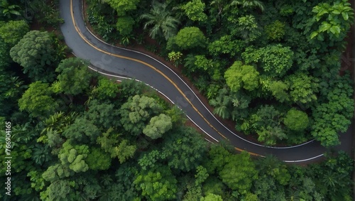 Bird's eye view of a winding road cutting through a lush forest during the rainy season Generative AI