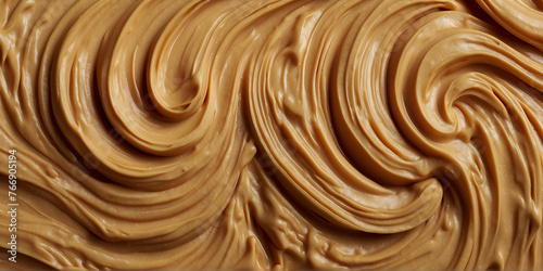 Close up of peanut butter spread Creamy smooth peanut butter backdrop, organic food