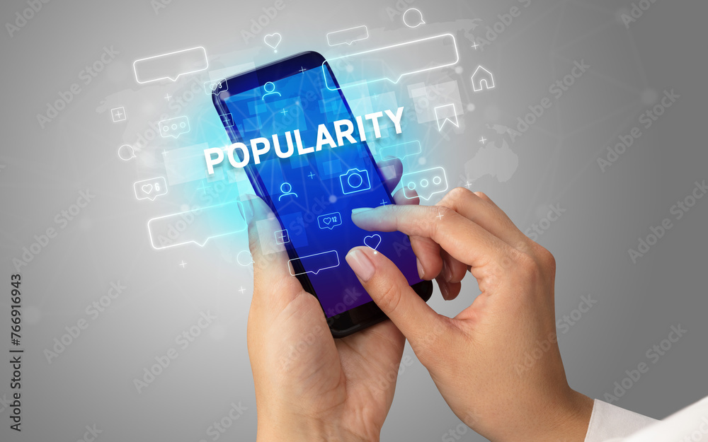 Hand using smartphone with social media concept Hand using smartphone with social media concept