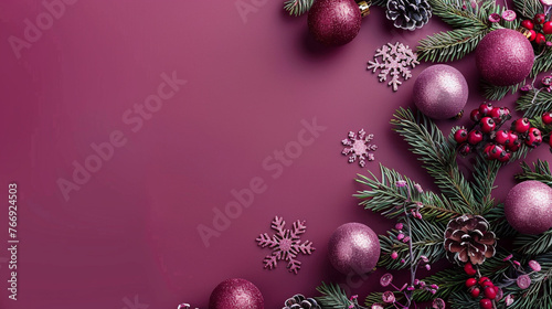 minimal top view of chritmas decorations on a bordeaux background with space for text or ads at right