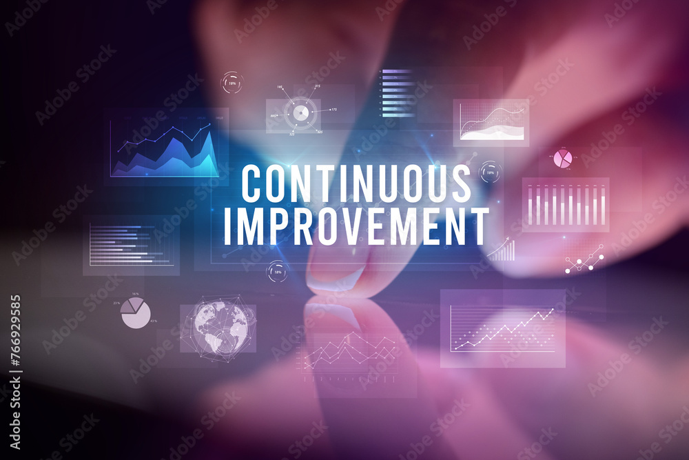 Finger touching tablet with business graphs and icons concept Finger touching tablet with business graphs and icons concept