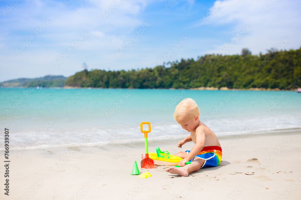 Kids playing on beach. Children play at sea. Kids playing on beach. Children play at sea.