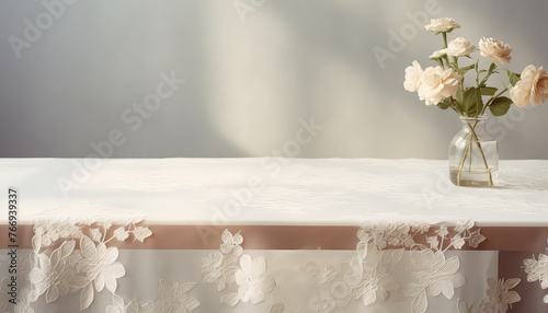 A table covered in a white lace tablecloth photo