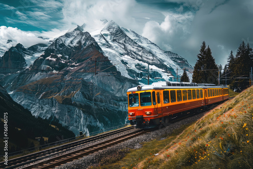 Red train passing through the Alps, lake and greenery in summer time. Luxury vintage passenger travel in the style of electric red cars for sightseeing tour of Europe © Kien