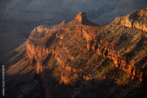 Grand Canyon north rim at golden sunset. Rock canyon, rocky mountains. Scenic view of Grand Canyon. Overlook panoramic view National Park in Arizona. Valley view at dusk.