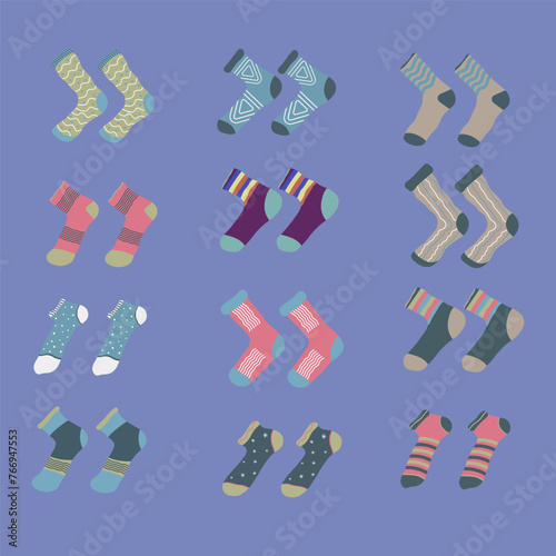 A set of socks in a different pattern. Flat vector illustration isolated on purple background