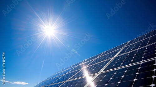 solar panels on the field under clear blue sky and sun