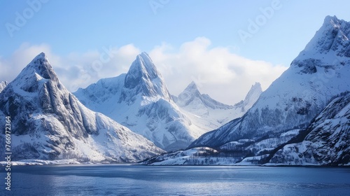 A ship in Norway passes by frozen mountains near the Arctic Circle.