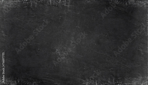 Old black grunge background. Distressed texture. Chalkboard wallpaper. Blackboard for text decoration; very cool; copy space photo