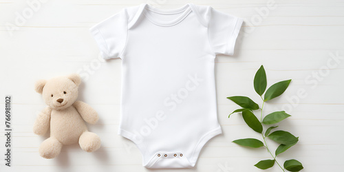  a baby, featuring a white shirt bodysuit, photo