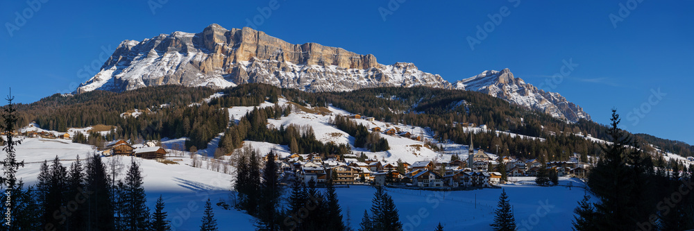 Panorama of dolomite massif during winter time with snow covered mountain peaks in Alta Badia at nature park Fanes-Sennes-Prags, South Tirol, Italy