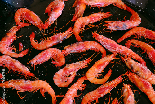 Cooking shrimp in a frying pan. Shrimp close-up.