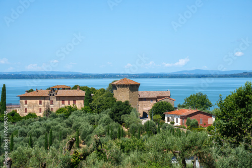 The Trasimeno lake at summer near Torricella and Monte del Lago