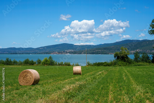 The Trasimeno lake at summer near Torricella and Monte del Lago photo