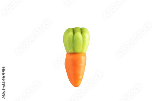 Marmalade in the shape of a carrot.
Jelly candy isolated on white background.
A carrot-shaped jelly candy displayed against a white backdrop.