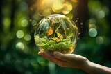 Earth crystal glass globe ball and growing tree in human hand, flying yellow butterfly on green sunny background. Saving environment, save clean planet. Card for World Earth Day - generative ai