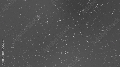 Animation dusting molecules flowing motion on grey gradient ,digital particle dust light, space wallpaper video background. 4K video.
