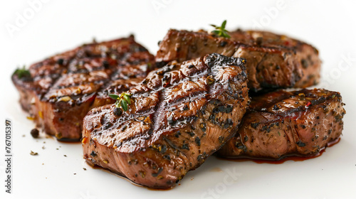 Spiced grilled beef steaks showcased against a white background.