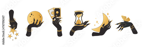 Witch hands in black and gold hold witchcraft. Hand with butterfly, moon, stars, hourglass, tarot cards, magic ball. Set of vector illustrations