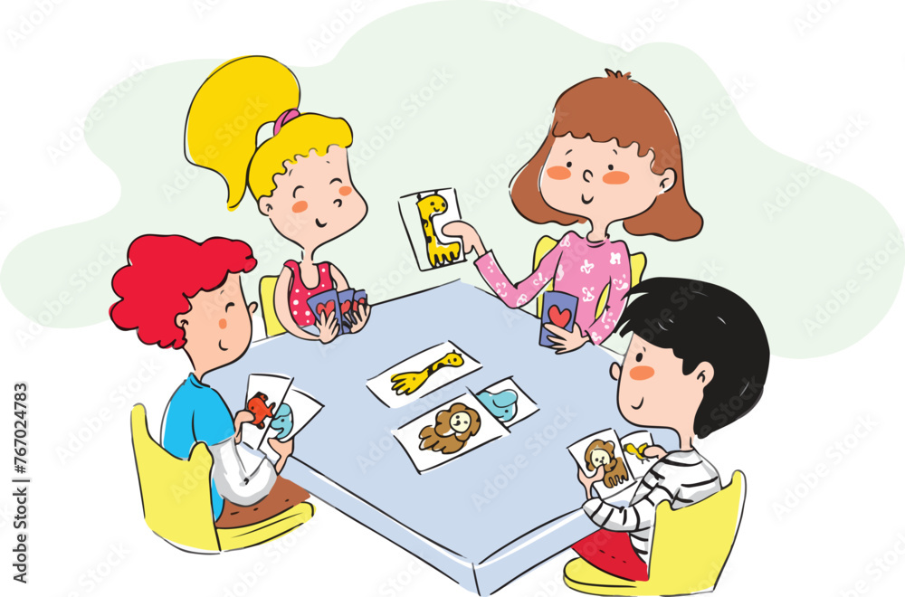 A group of children playing a card game. They are sitting at the table. A group of children playing a card game. They are sitting at the table.