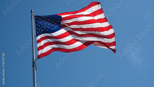 American flag waving in sky