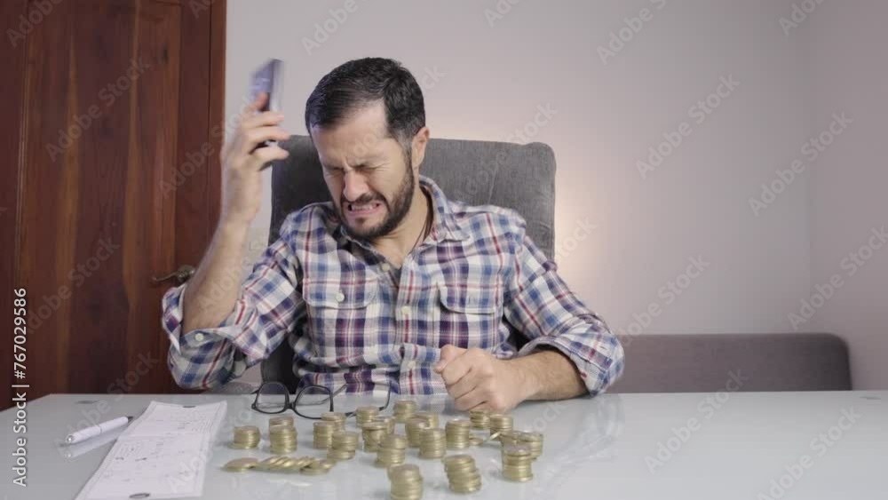 Man hit his head with calculator in office. Business bankruptcy. Bad business bankrupt Man hit his head with calculator in office. Business bankruptcy. Bad business bankrupt