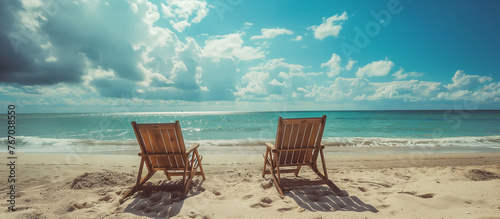 chairs on a beach © Creative-Touch