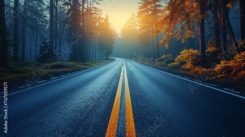 An empty road is depicted with a blurred background to convey motion.