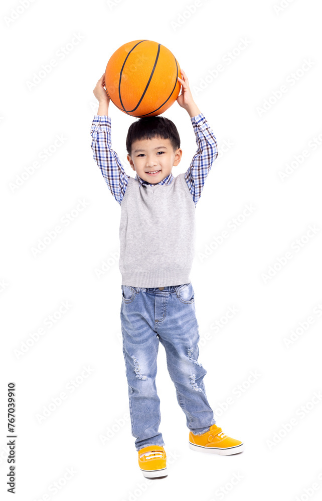 Happy asian Boy holding a basketball and smiling isolated on white background Happy asian Boy holding a basketball and smiling isolated on white background