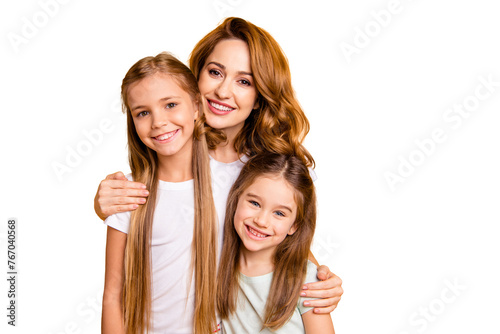 Portrait of three nice cute lovely winsome attractive cheerful cheery blonde positive people cuddling bonding relatives isolated over bright vivid shine yellow background photo