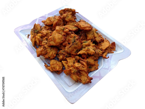 A plate filled with crispy and tasty Pakora - Street Food