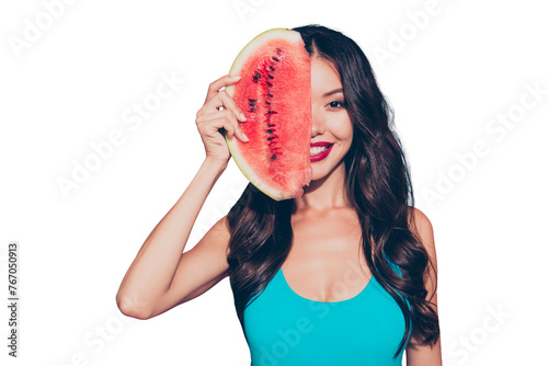 Close-up portrait of cute shine look cheerful funny funky playful attractive luxury wavy-haired lady red lips holding melon slice closing covering half face behind isolated on pink pastel background