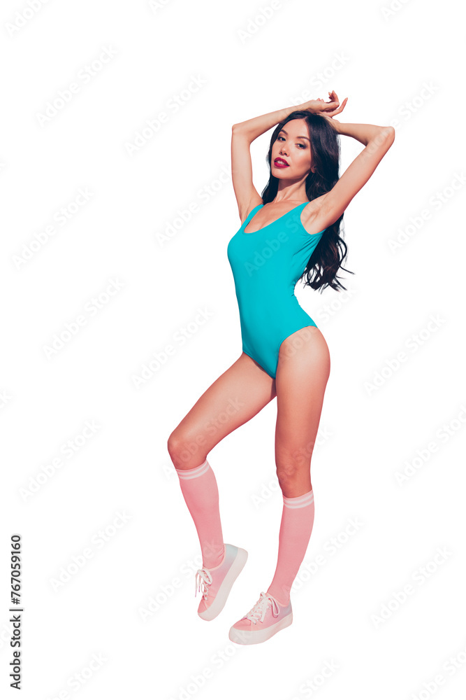 Vertical full length body size portrait of adorable lovely attractive gorgeous luxury wavy-haired lady red lips blue one-piece outfit shoes footwear posing isolated over pink background Vertical full length body size portrait of adorable lovely attractive gorgeous luxury wavy-haired lady red lips blue one-piece outfit shoes footwear posing isolated over pink background