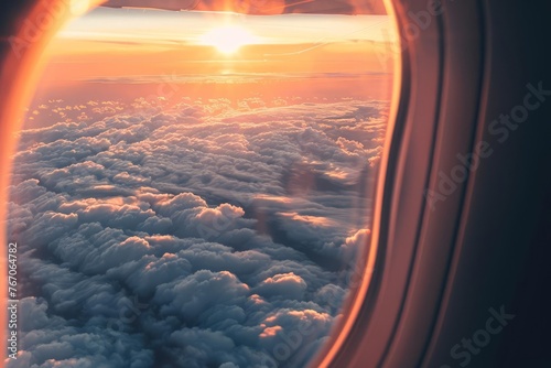 Airplane window seat view of sunset horizon and clouds, air travel and wanderlust concept photo