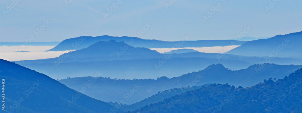 blue mountains views sierra madrid guadarrama port navacerrada fog gray distance - obrazy, fototapety, plakaty 