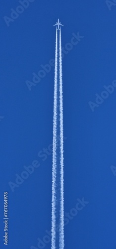 Фотография chemtrails denier conspiracist contrail plane reaction contrail condensation on