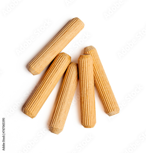 Wooden dowels isolated on white background