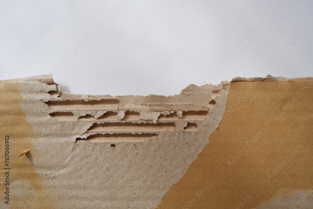 ripped cardboard piece paper note. damage cardboard for background ...