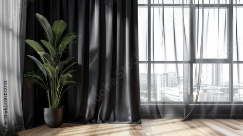 Black curtains fluttering in the wind against the background of a room window.