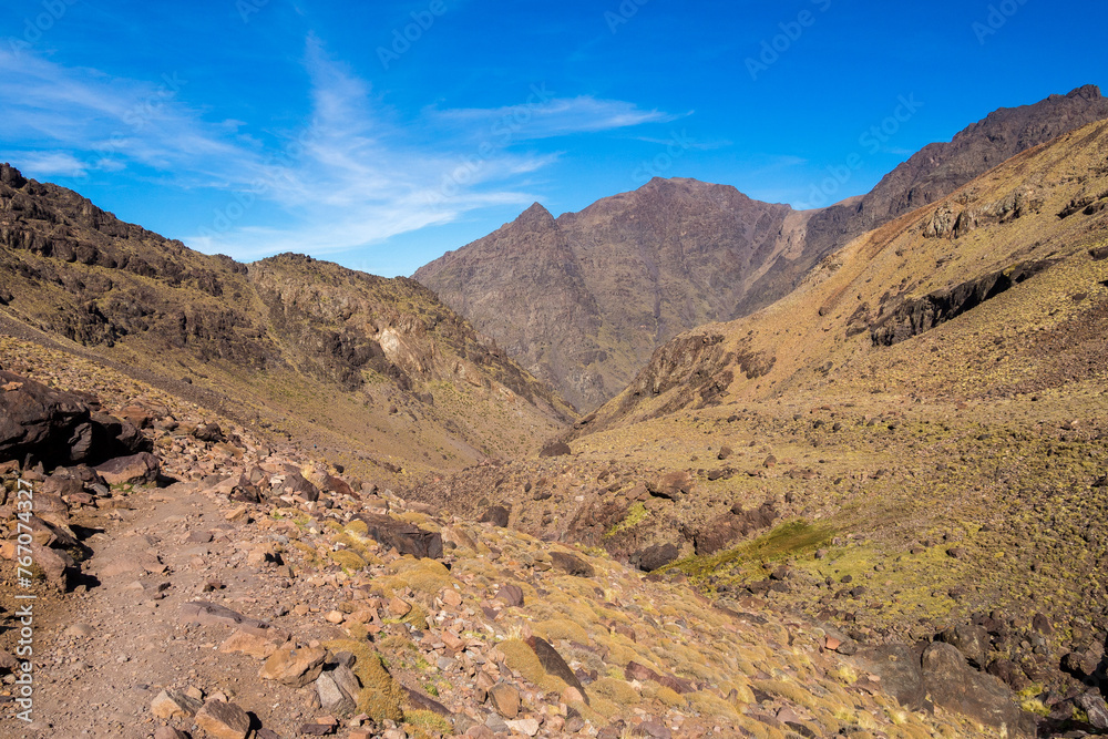 Tranquil hiking trail near Imlil. Valley route to Toubkal peak in Toubkal National Park, Atlas Mountains, Morocco