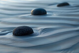 Smooth Stones in Calm Water with Gentle Ripples