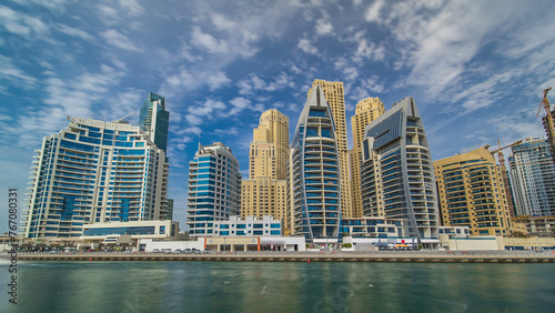Dubai Marina towers in Dubai at day time timelapse hyperlapse © neiezhmakov