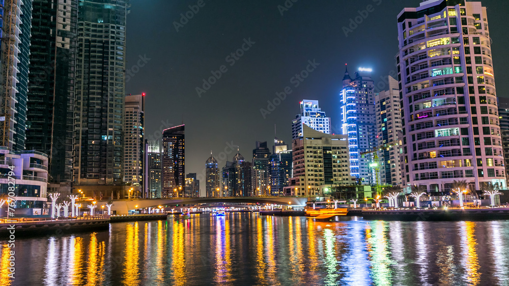 Dubai Marina towers and canal in Dubai night timelapse