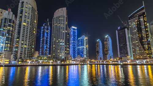 Dubai Marina towers and canal in Dubai night timelapse hyperlapse