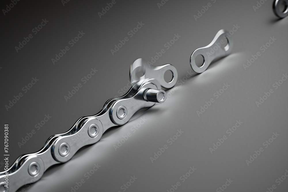 Detailed View: Bicycle Chain Link Isolated Against a Striking Gray Backdrop