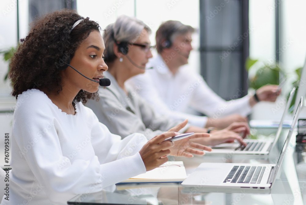 Business group working in customer and help desk office Business group working in customer and help desk office