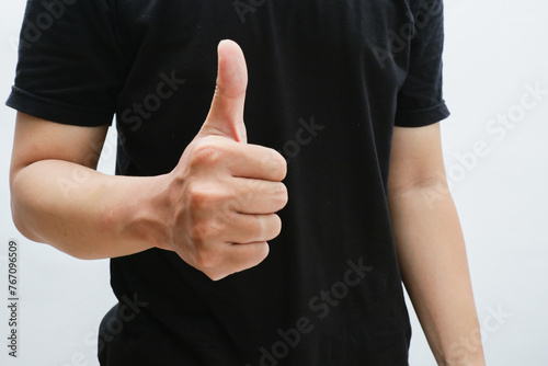 cropped image of a man thumbs up, close up hand