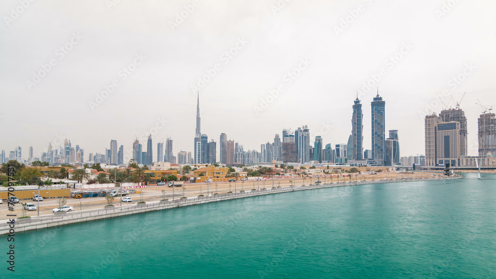 The new Dubai Water Canal with view on the city skyline timelapse, United Arab Emirates
