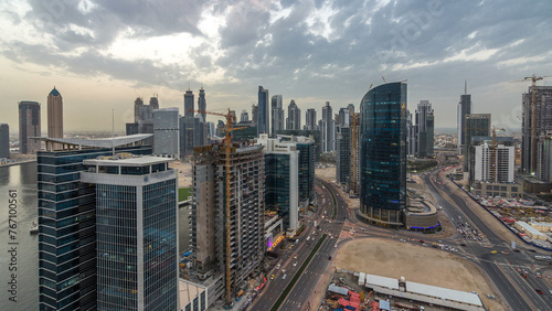 Dubai business bay towers day to night timelapse aerial