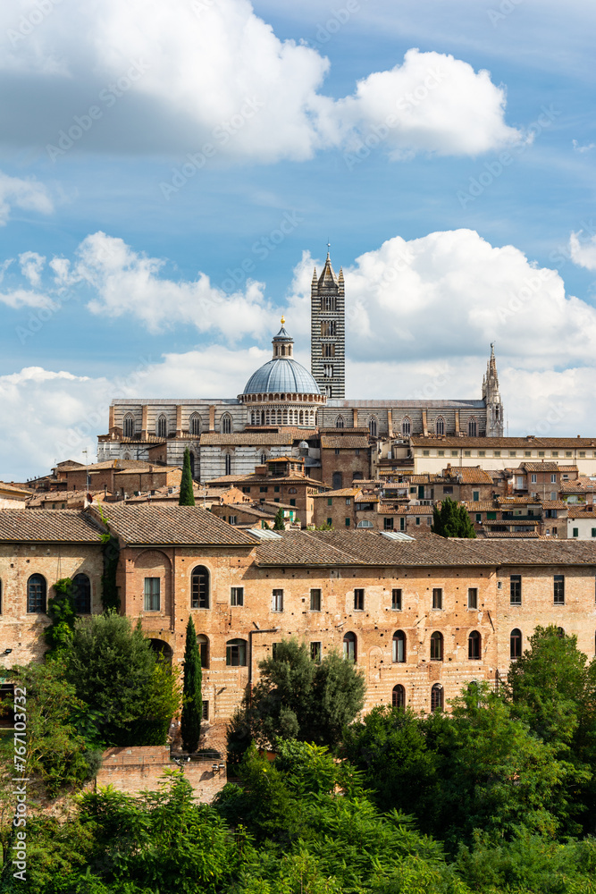 The historic city of Siena in the heart of Italy's Tuscany, with the famous cathedral of Santa Maria Assunta with its striped facade